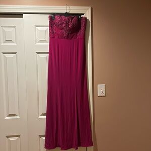 Dark Fuscia strapless gown.